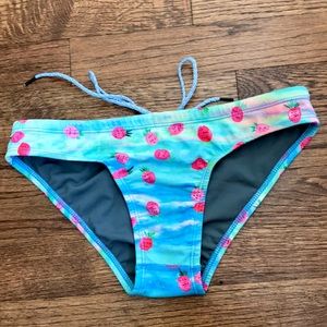 Jolyn bikini bottom. Teal water design with cute pink strawberry pattern.